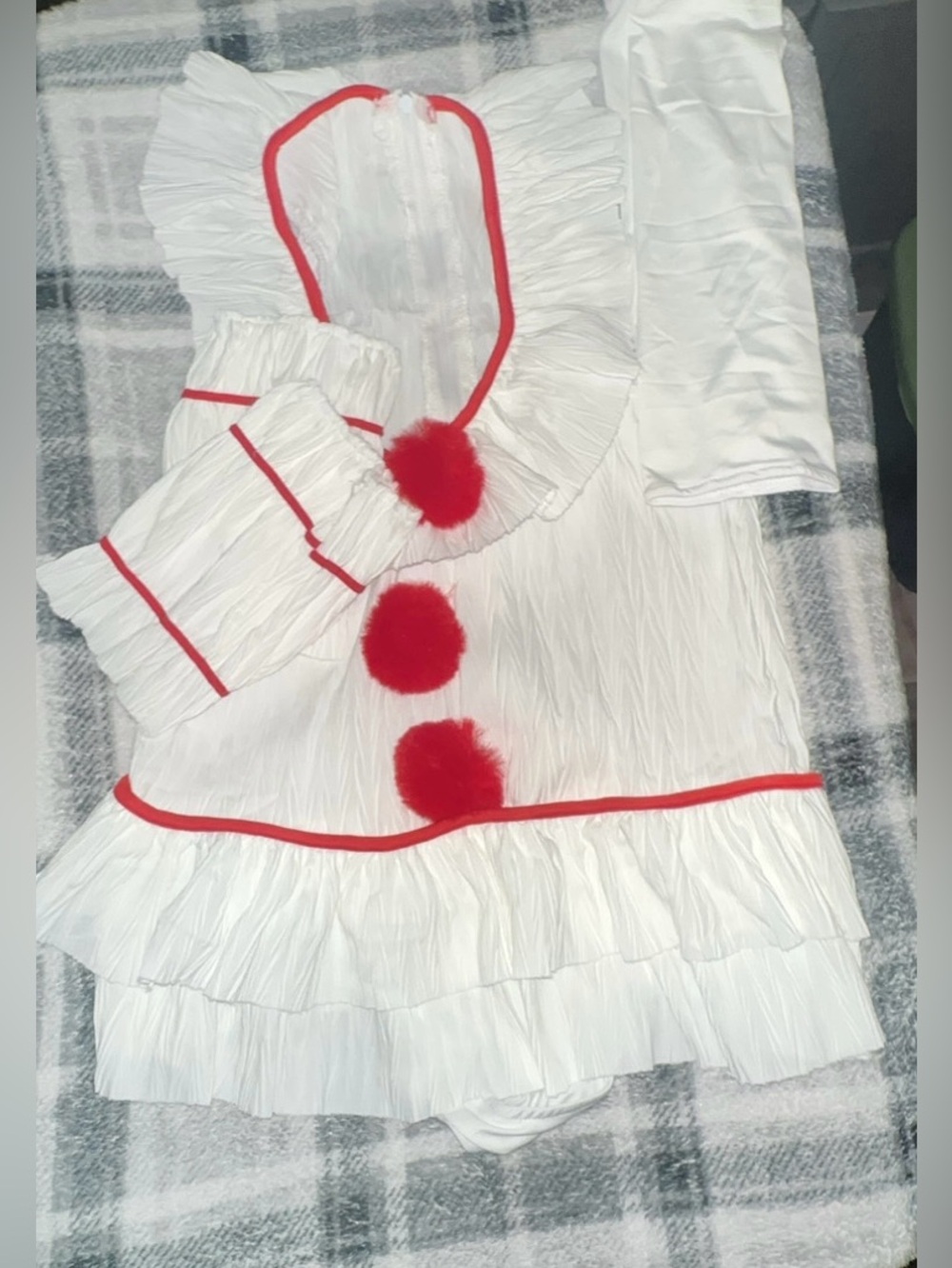White & Red Ruffle Pom-Pom body suit.